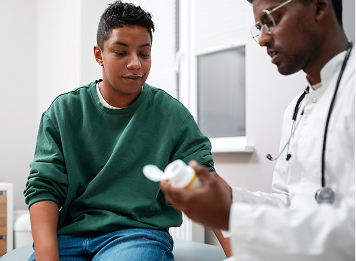 Doctor explaining medication to patient